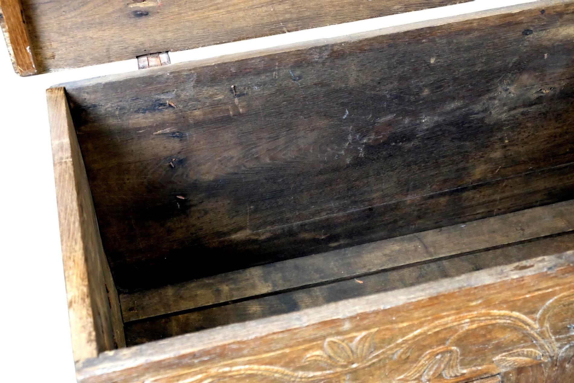 18th century oak chest with interesting carving.