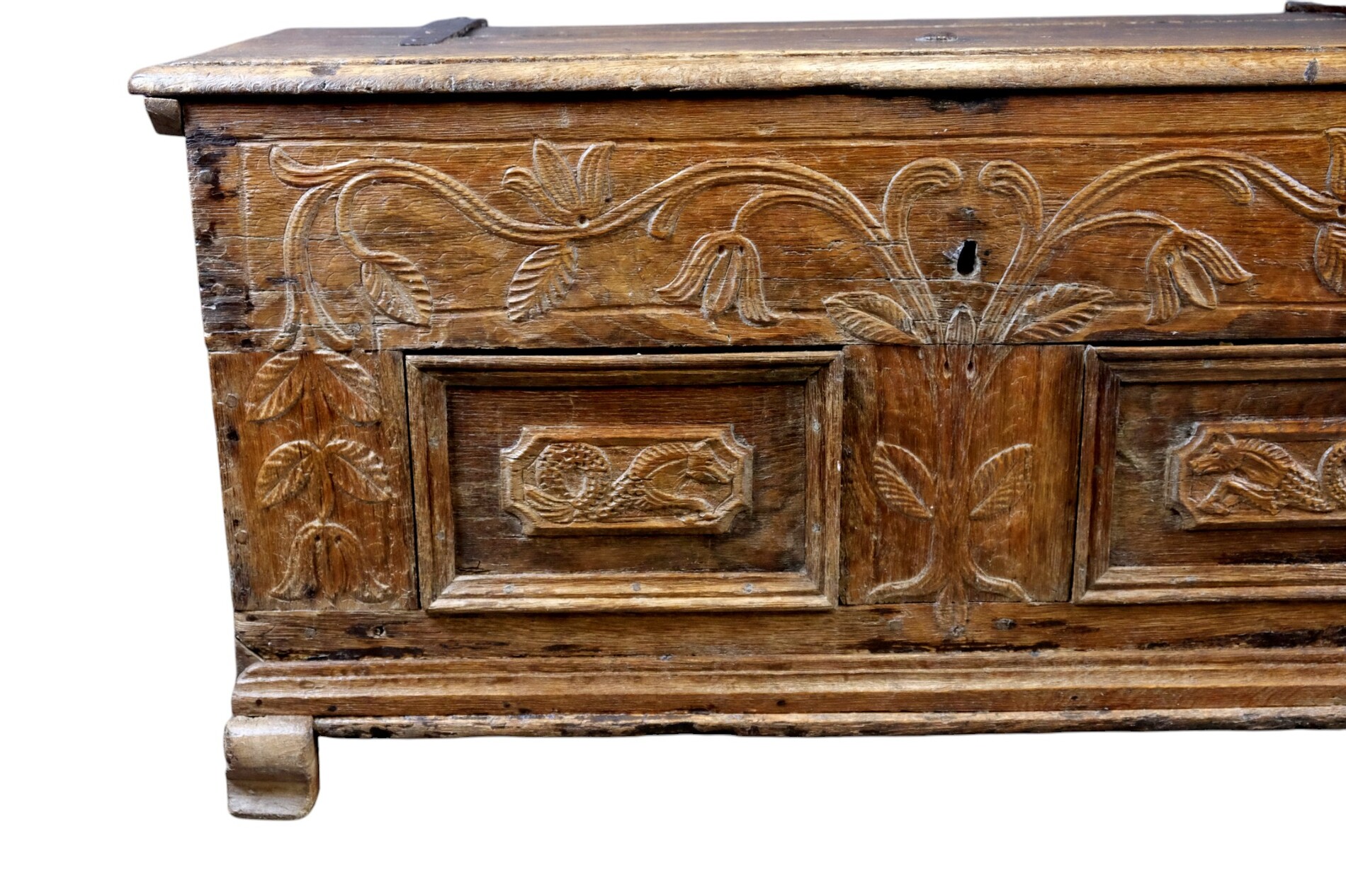 18th century oak chest with interesting carving.