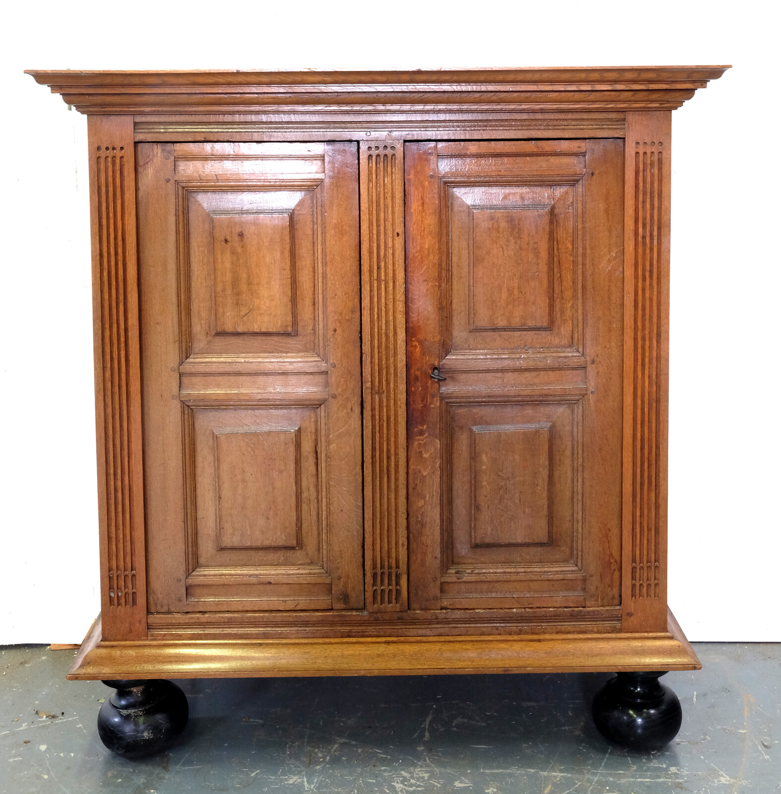 Blond oak two-door cabinet from around 1700.