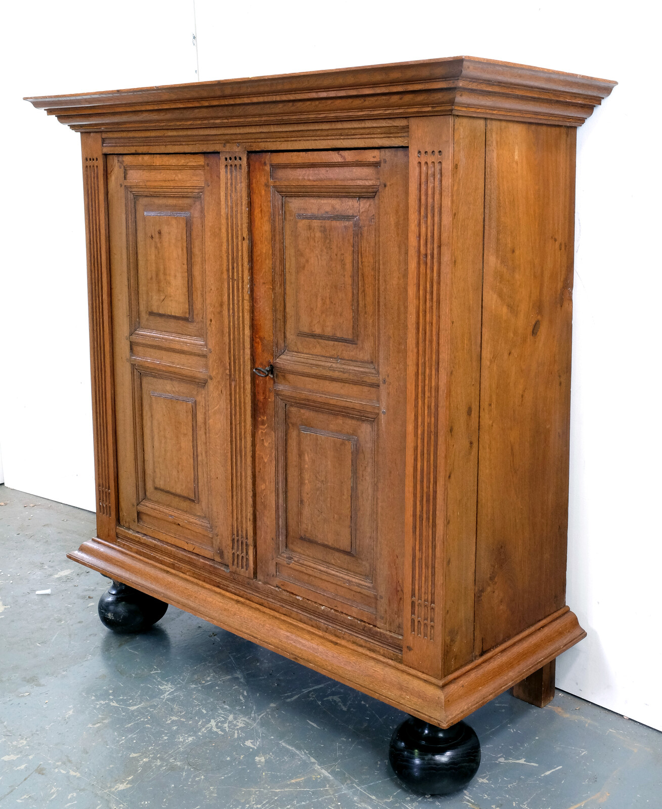 Blond oak two-door cabinet from around 1700.